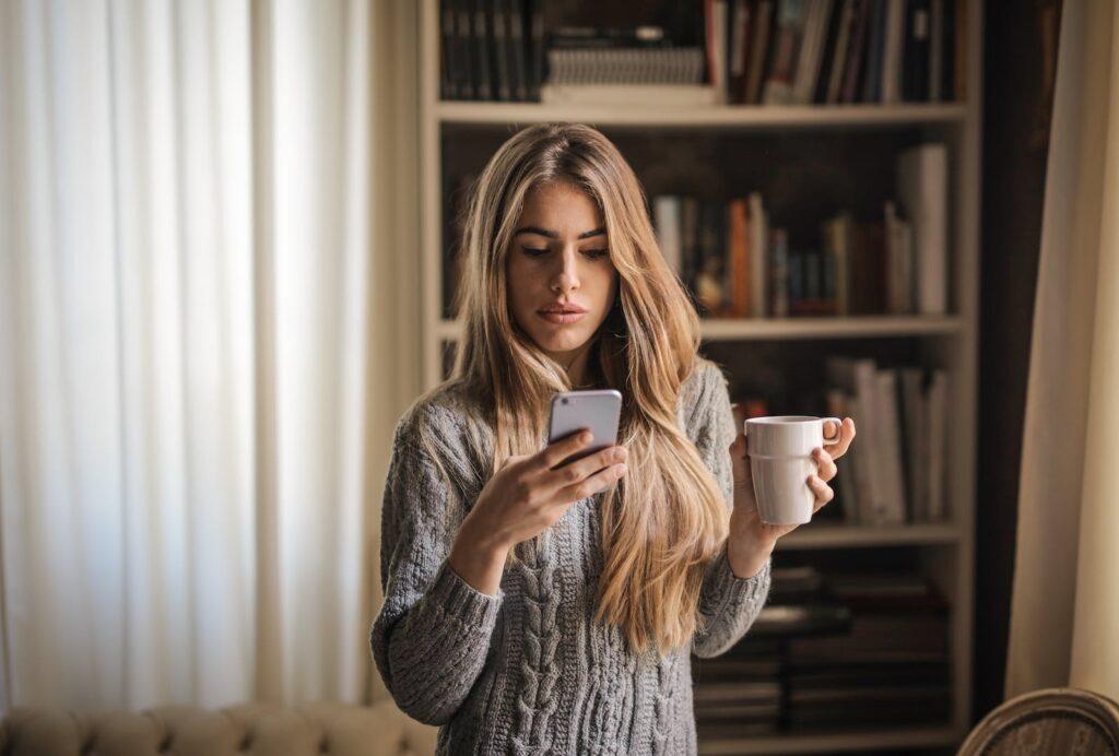 Photo of Woman Wearing Gray Sweater