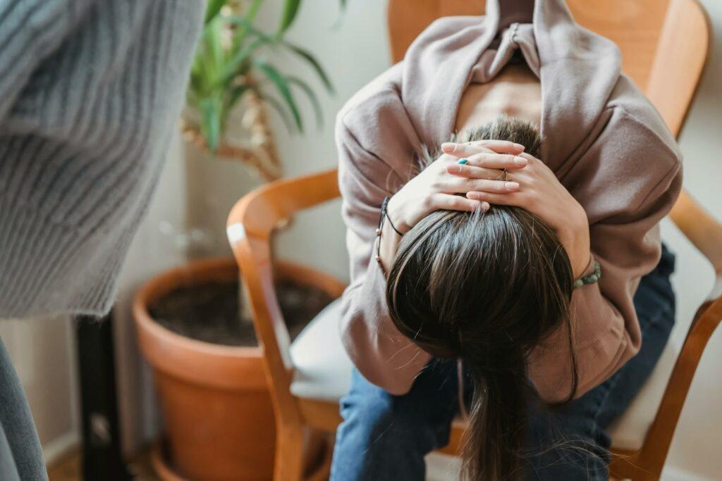 Unrecognizable woman having dispute with crop person