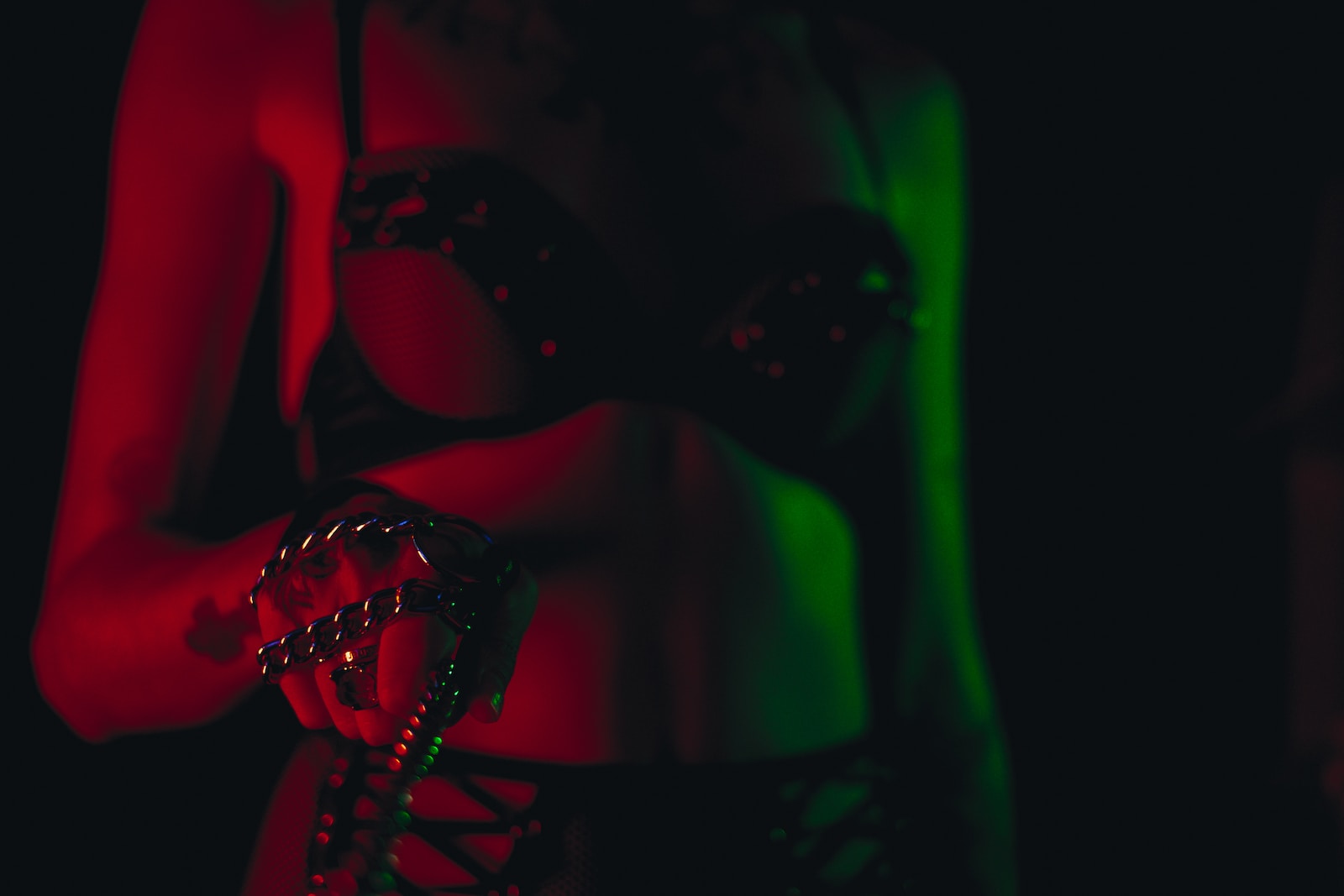 black brassiere on green textile