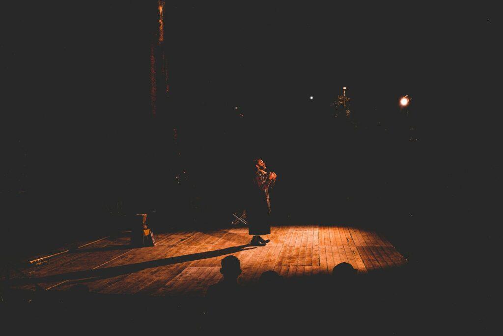 person standing on stage